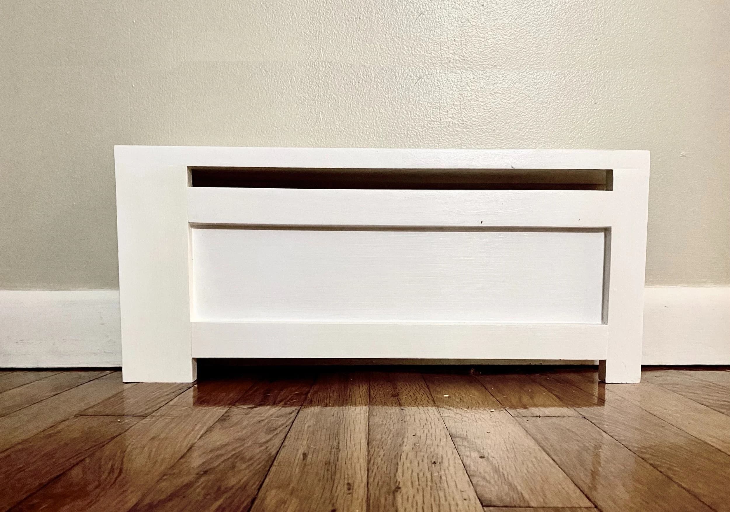 The Craftsman Shaker-style baseboard cover