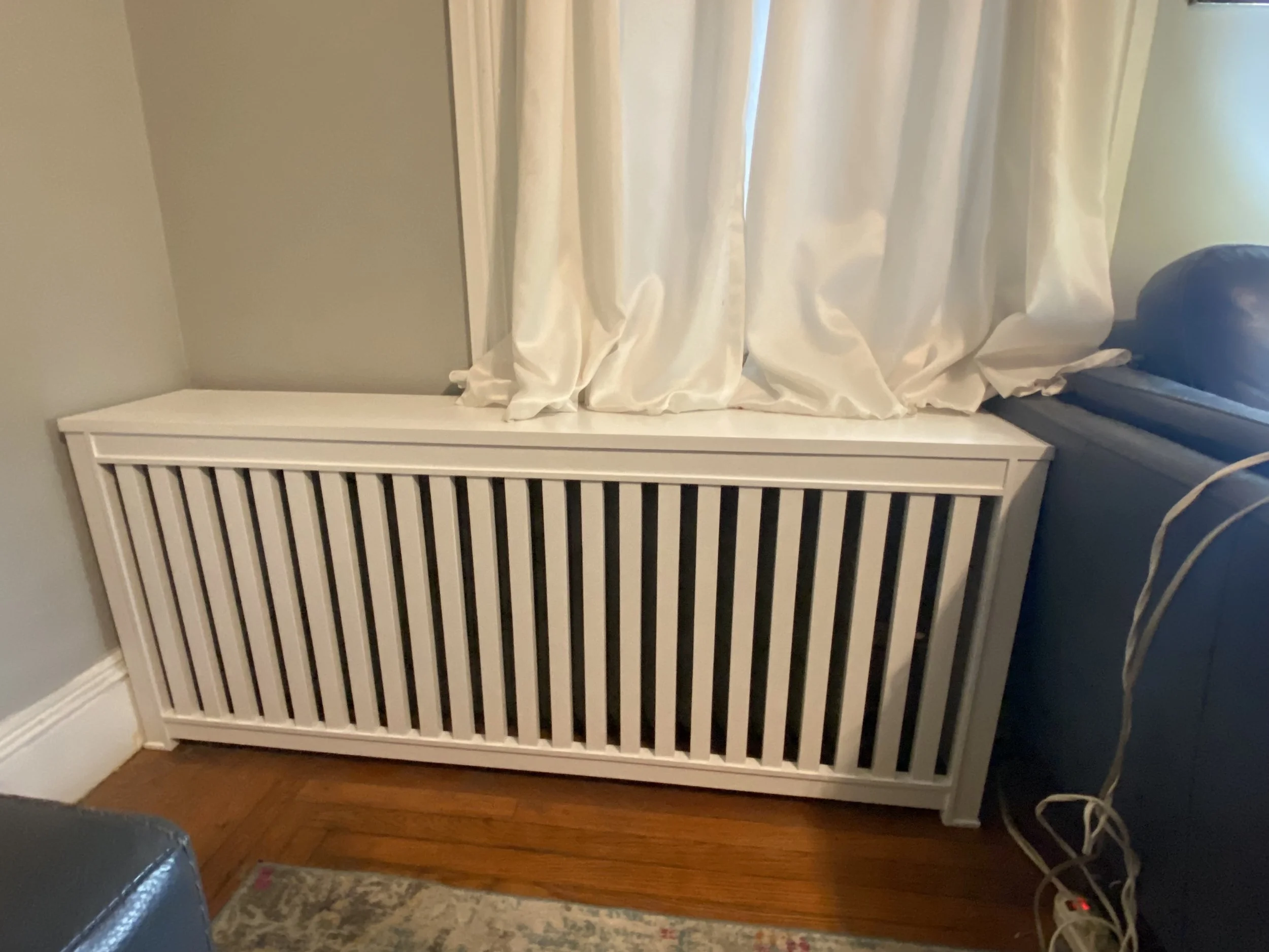 Long Shaker radiator cover under curtains